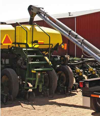 Telescoping belt can easily fill a central fill planter with one stop.